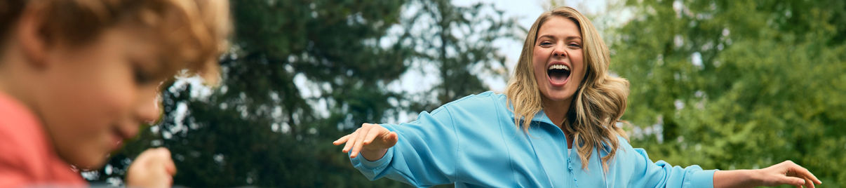 Woman and child hoola hooping