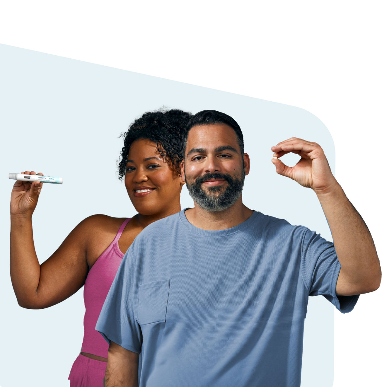 Man and woman smiling holding a Wegovy<sup>®</sup> injection pen and Wegovy<sup>®</sup> pill