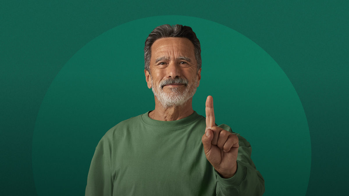Man holding up his index finger