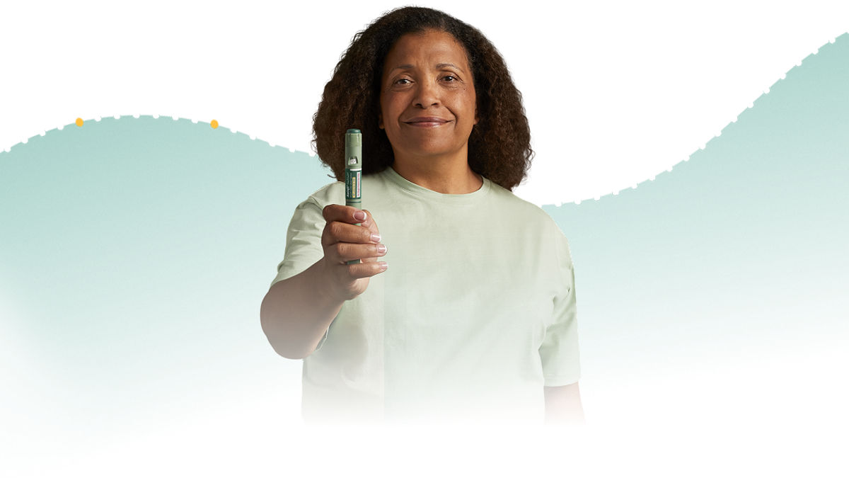 Woman holding an Awiqli® FlexTouch® pen out in front of her