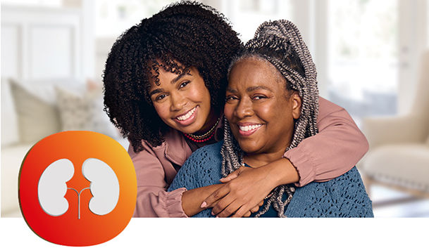Two women hugging and smiling