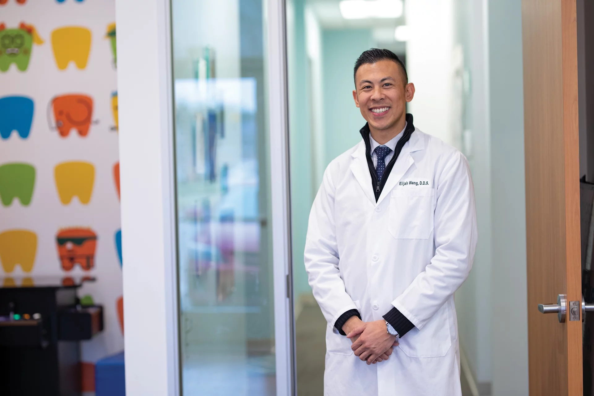 Dr. Elijah Wang, D.D.S, smiling for a picture