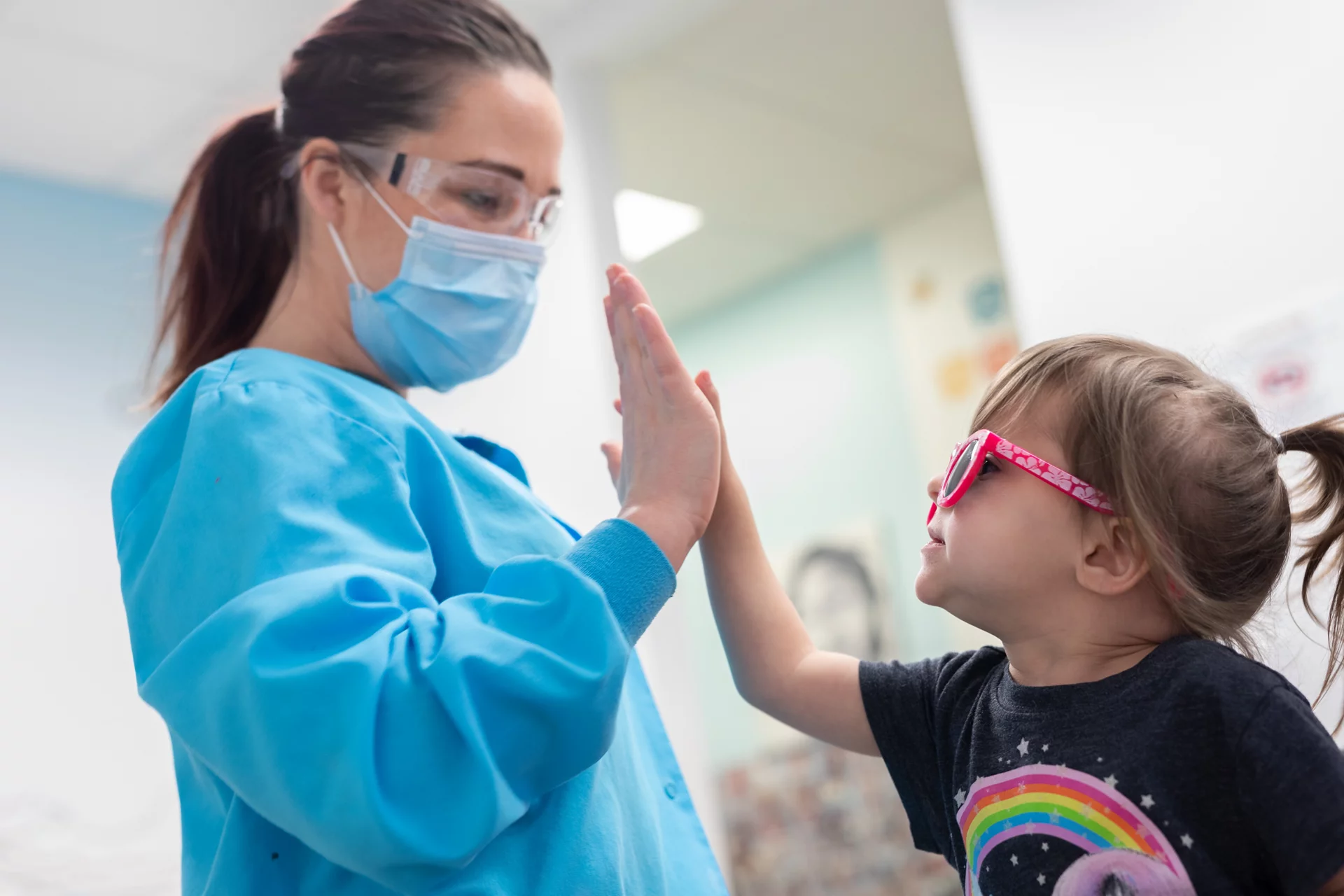 Dentist and child high five
