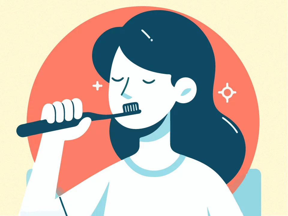 woman brushing teeth