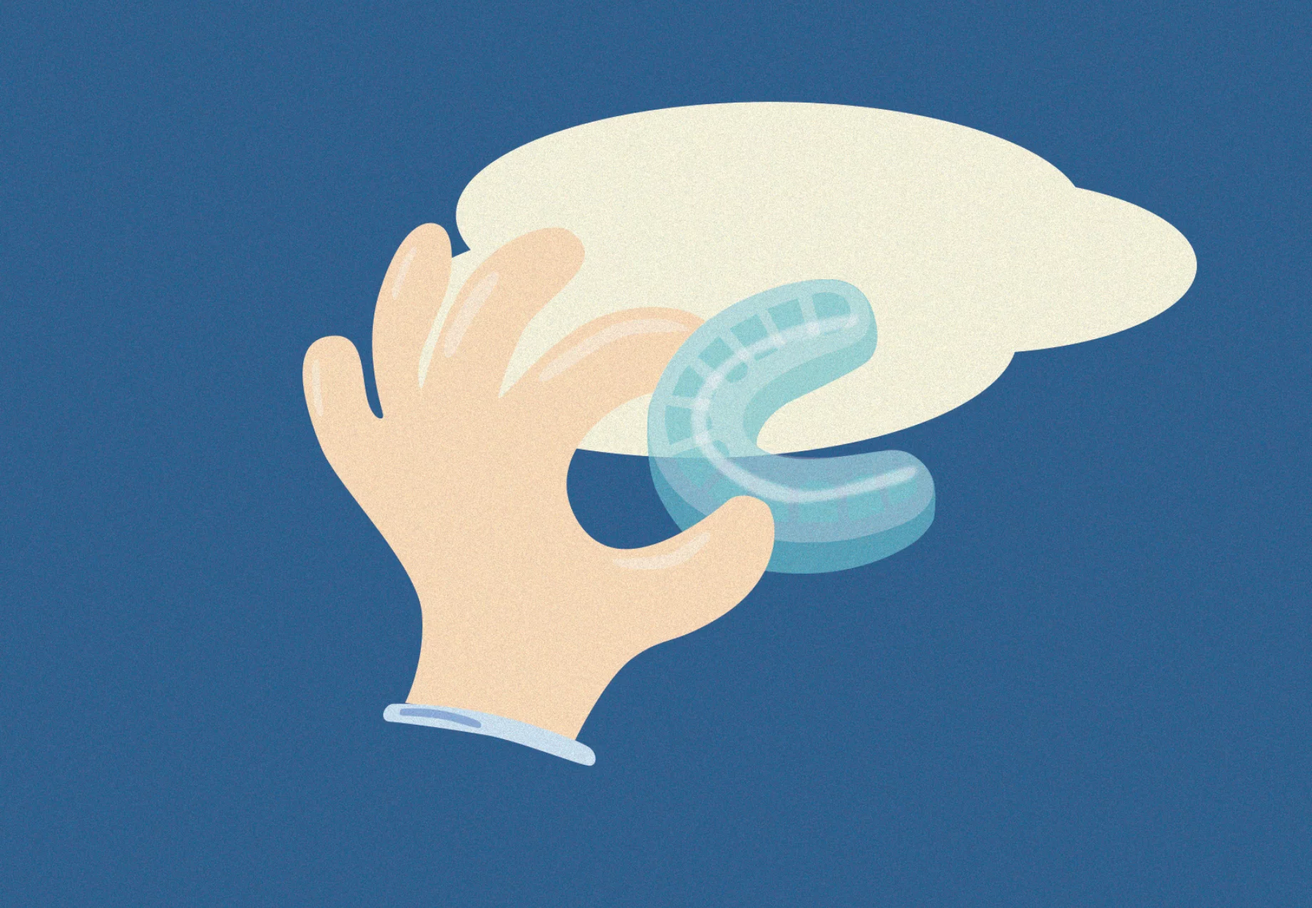 Hand holding clear aligners