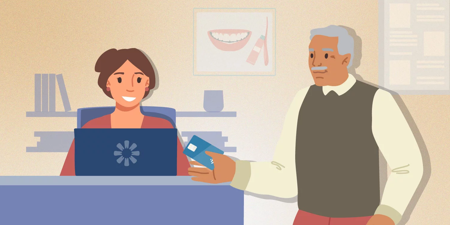 Senior citizen paying with a credit card