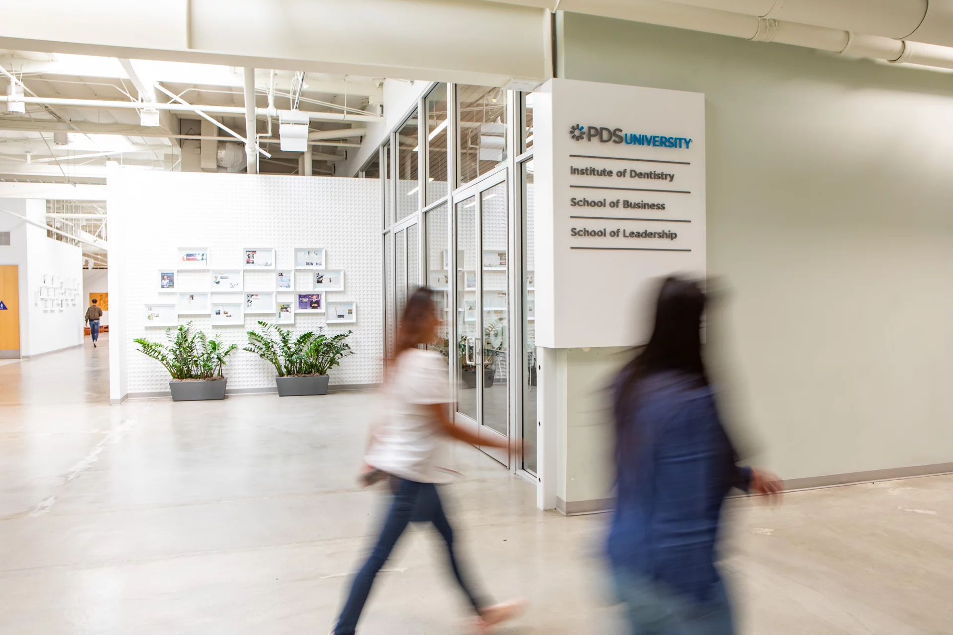 PDS employees walking through PDS building