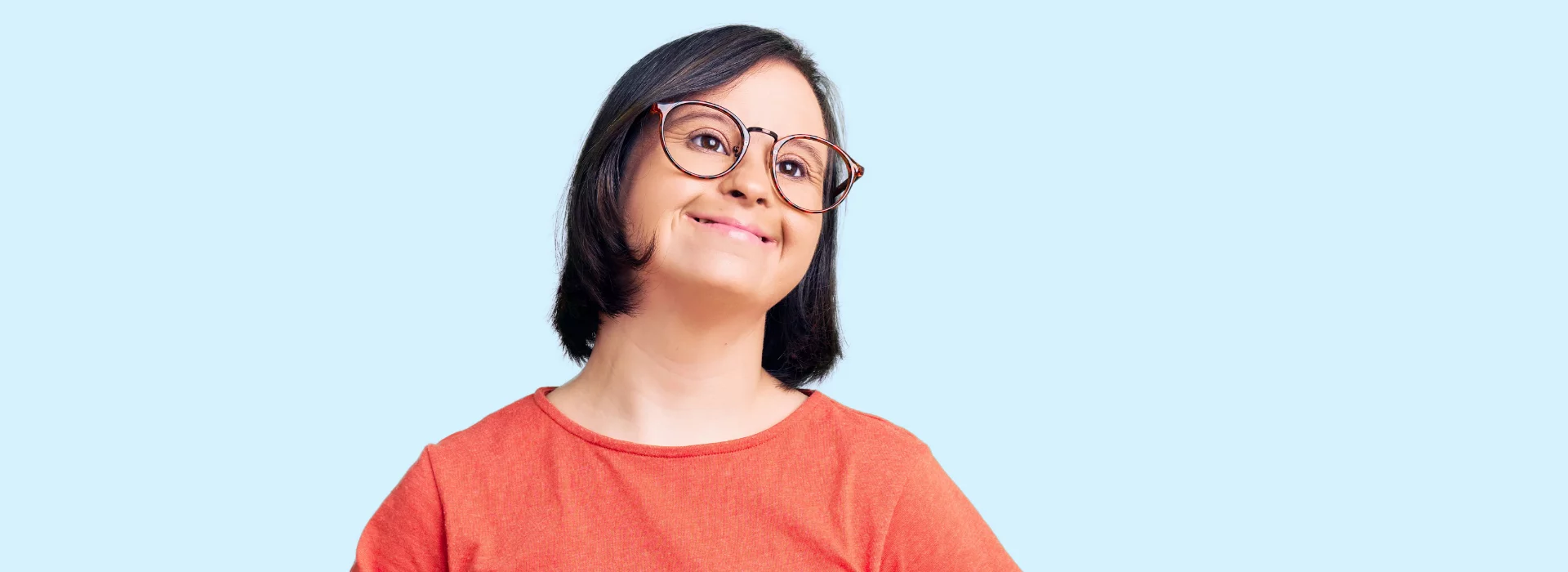 Girl with glasses smiling