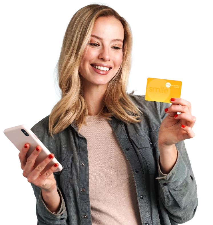 Woman with credit card and phone