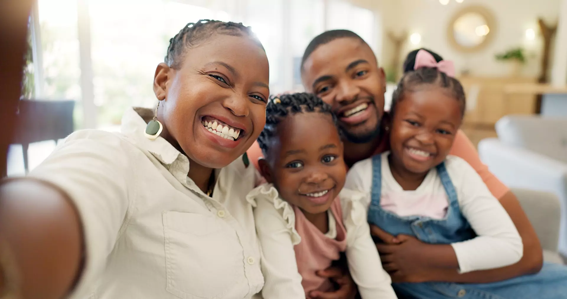 Black family, selfie and happy with parents and children at home, love and bonding with memory for social media. Live streaming, happiness and portrait, together and people smile in picture for post.