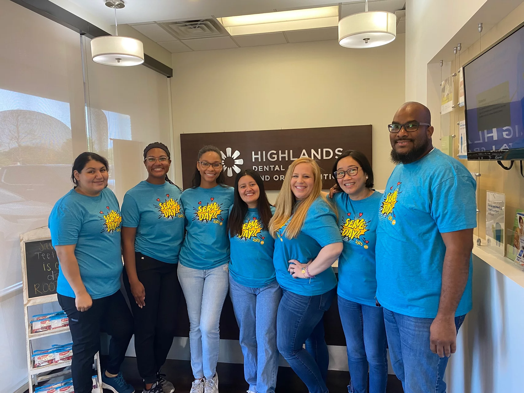 Image of volunteers smiling on Pacific Dental Service's Serve Day