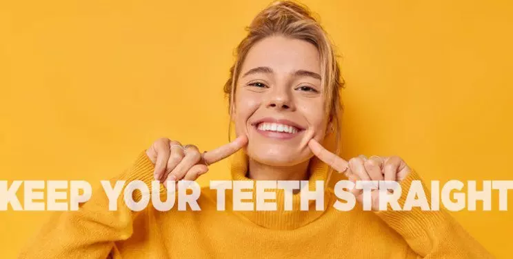 Girl pointing to her mouth on a yellow background with the words keep your teeth straight