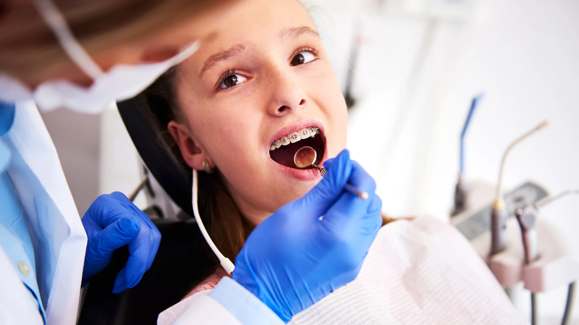 Young girl at the dentist