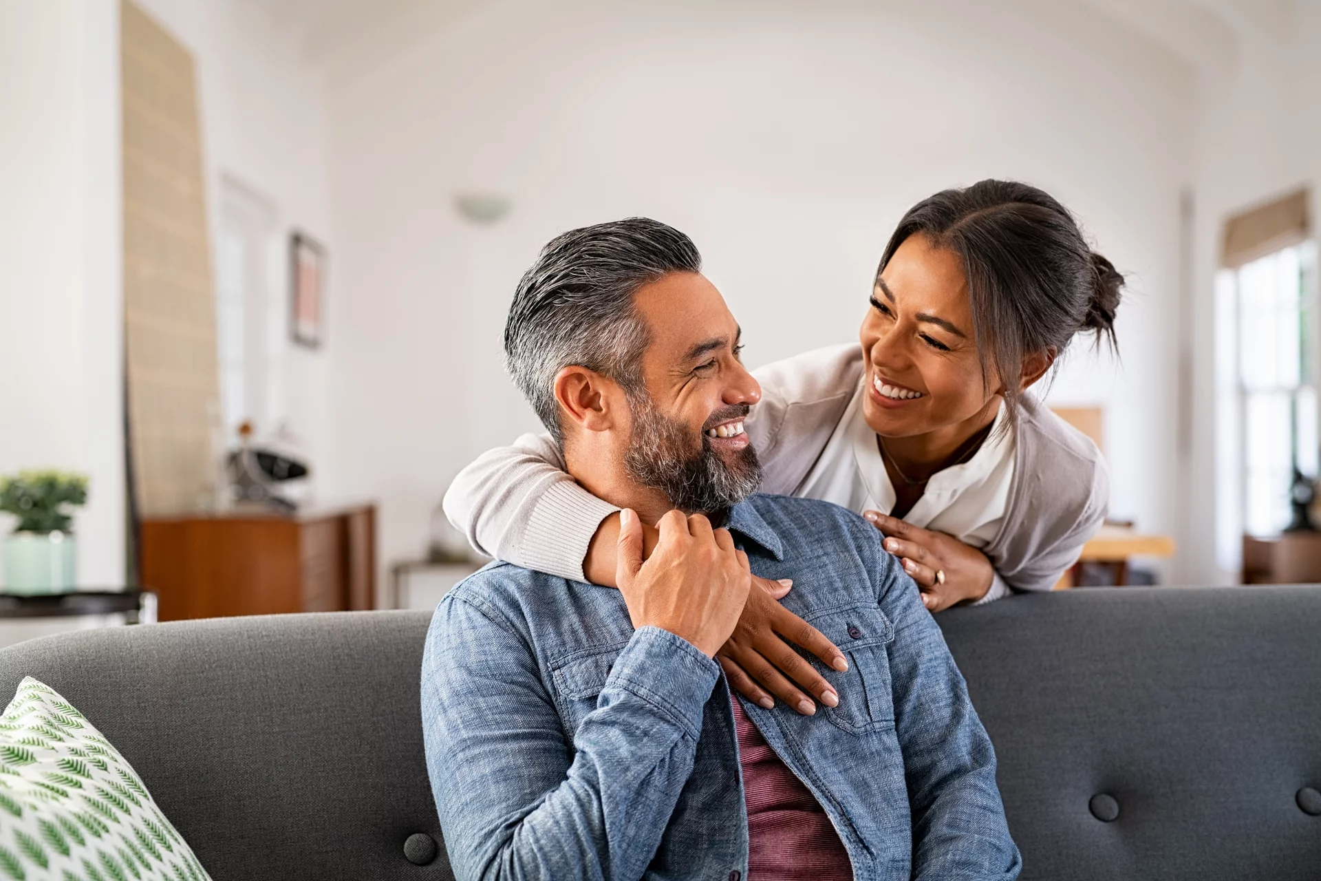 Hispanic couple on couch