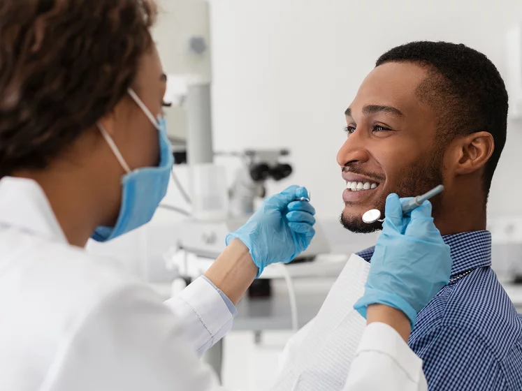 Man with big smile at the dentist