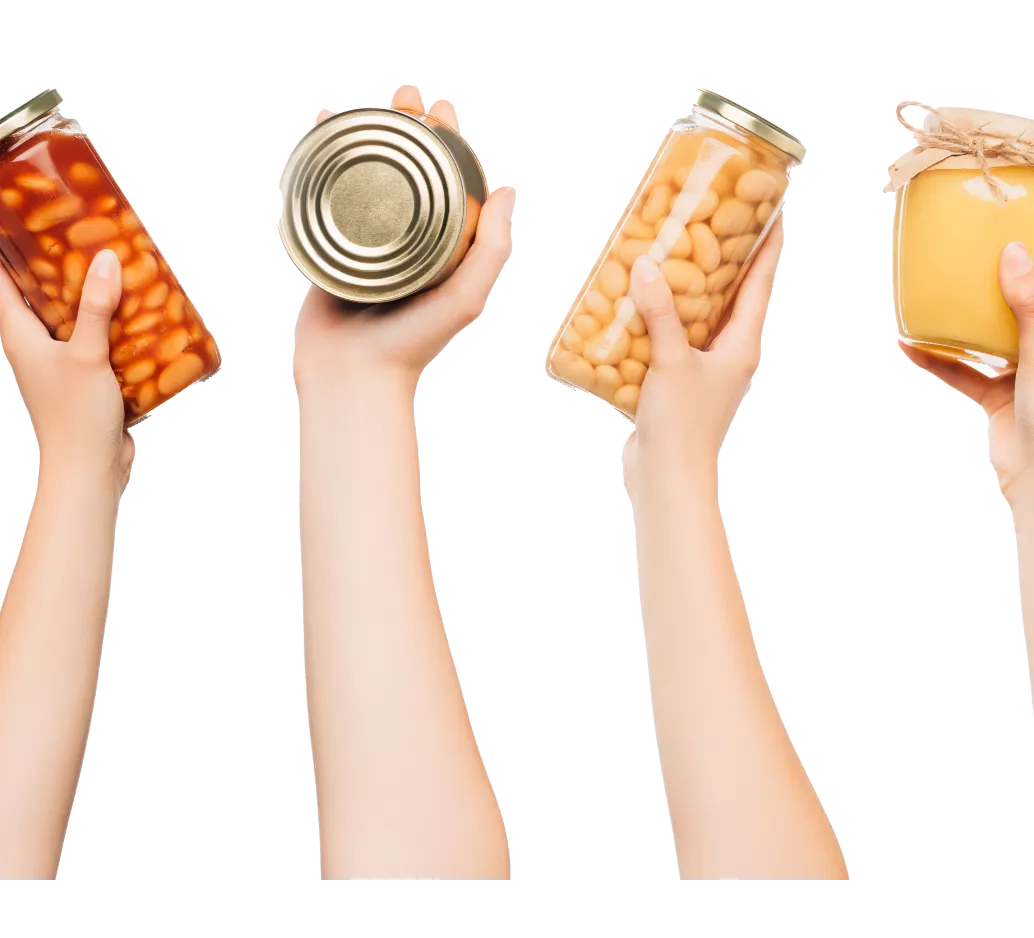Hands holding jars and cans of food