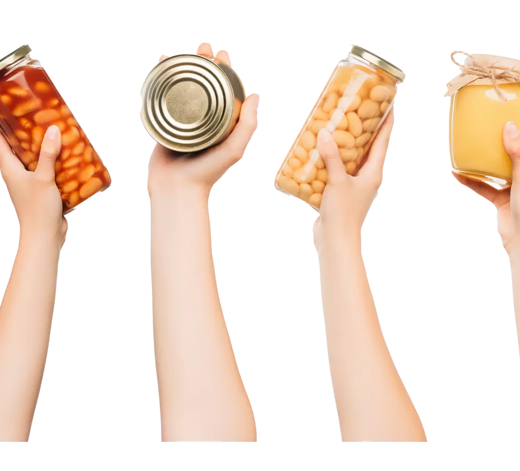 Hands holding jars and cans of food