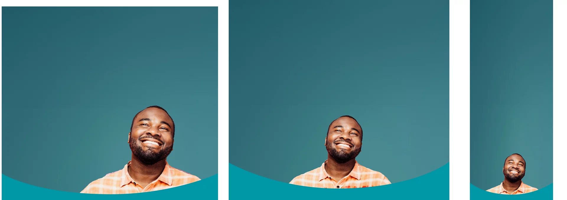 Man smiling in front of blue background