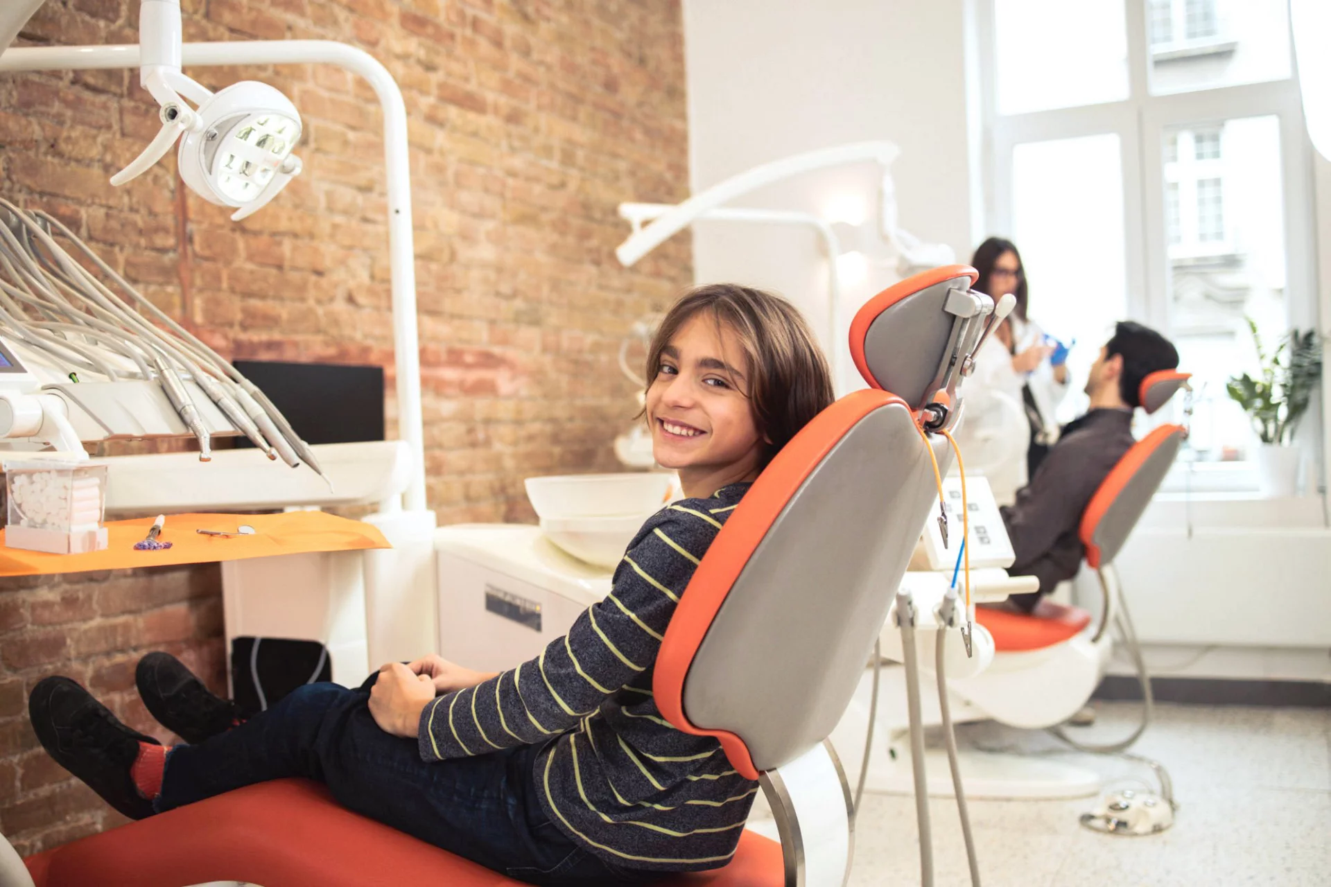boy in chair at dentist