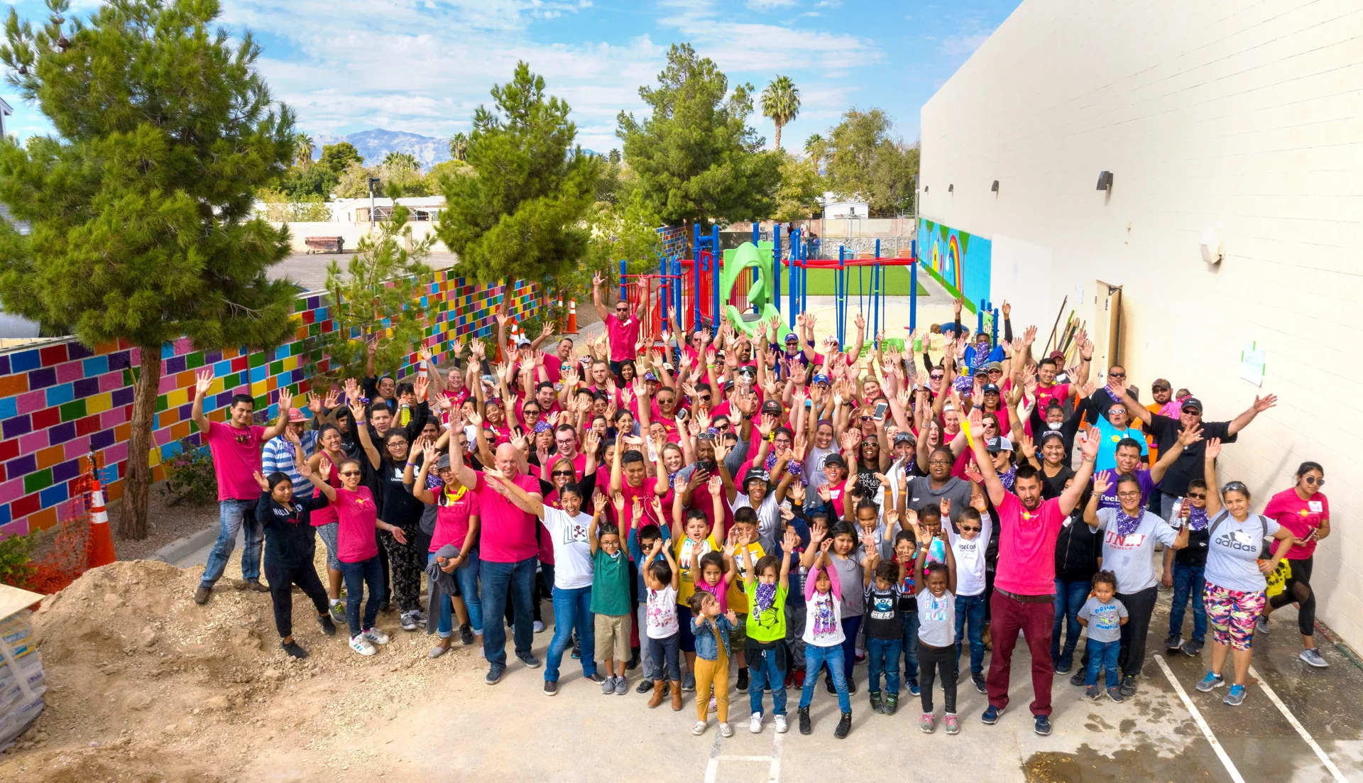 Kaboom playground with volunteers cheering