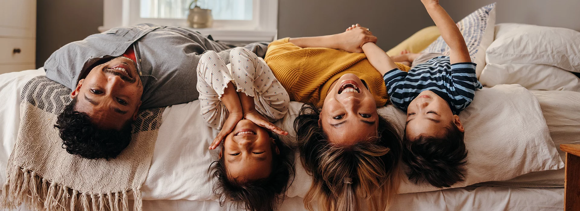 Family on bed