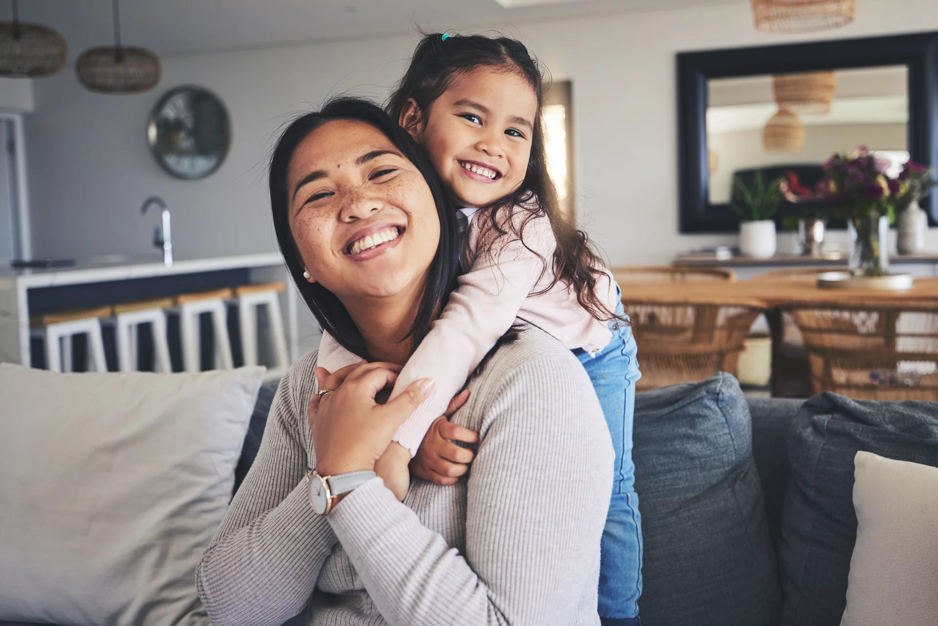 Woman smiling with daughter