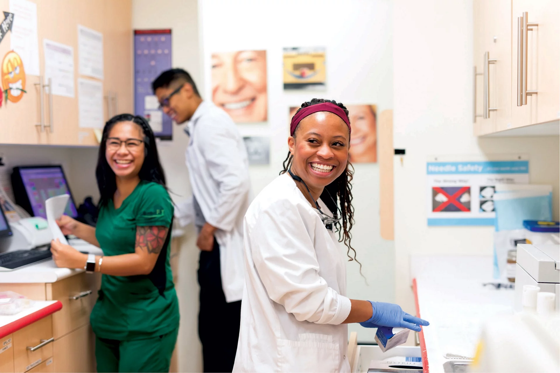 Dentist and Dental Assistant Smiling