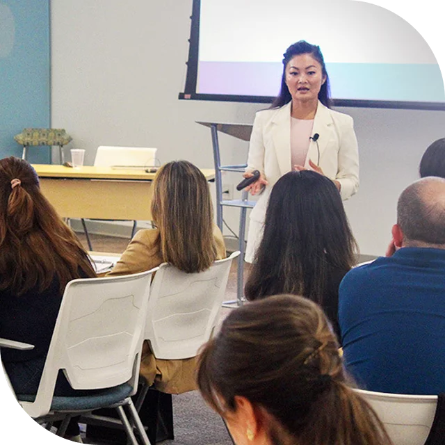 Woman teaching class