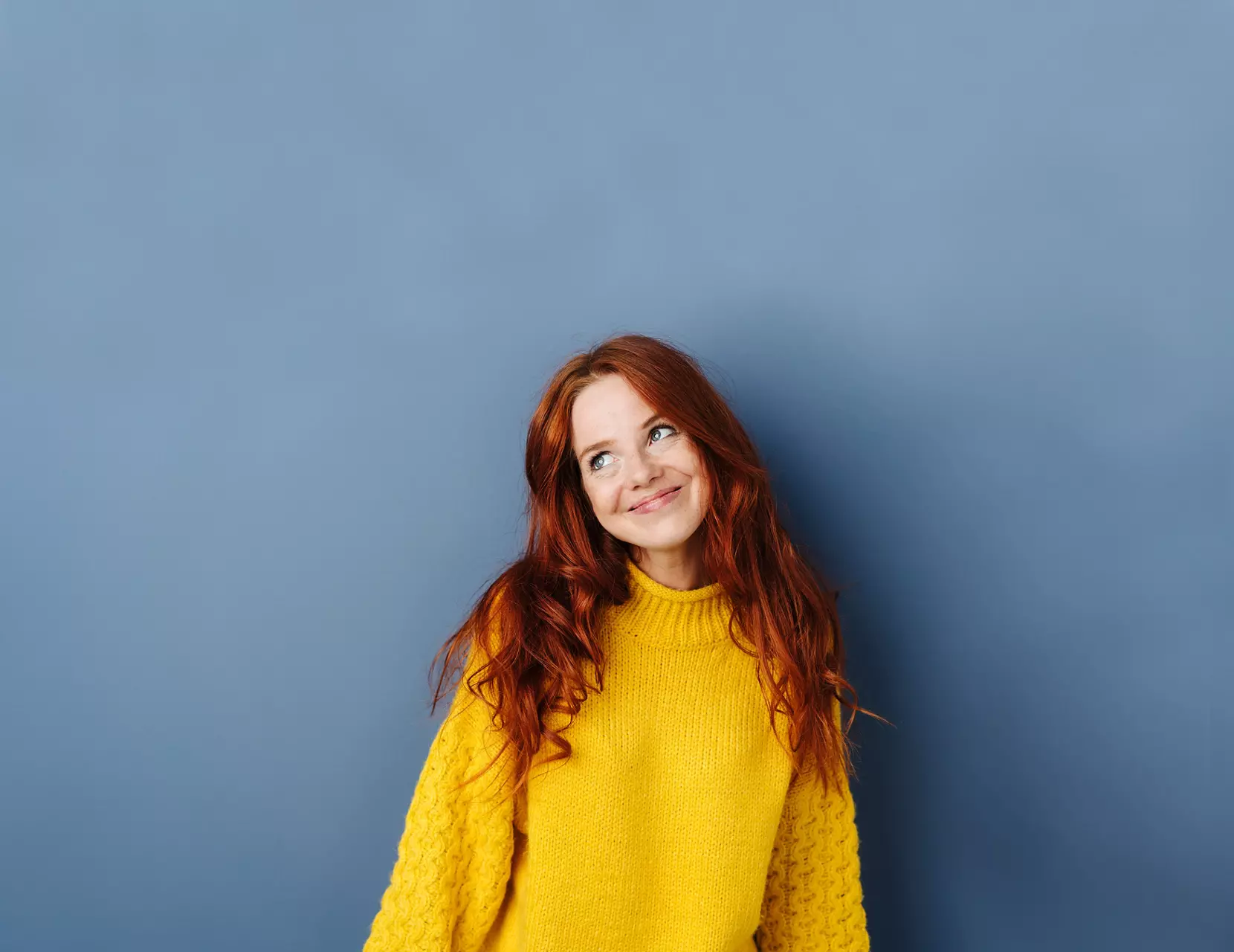 Woman in yellow sweater