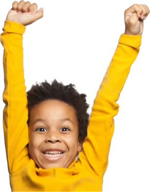 Young child with arms raised celebrating