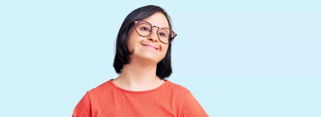 Girl with glasses smiling
