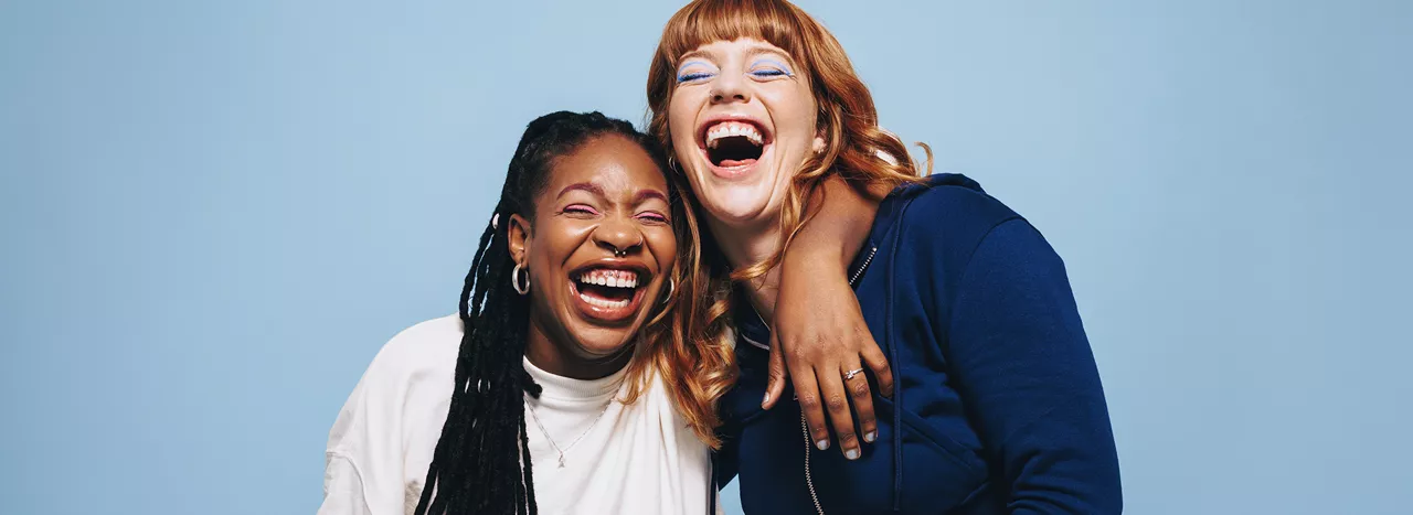 Two women laughing
