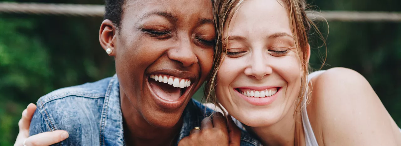 Two women laughing