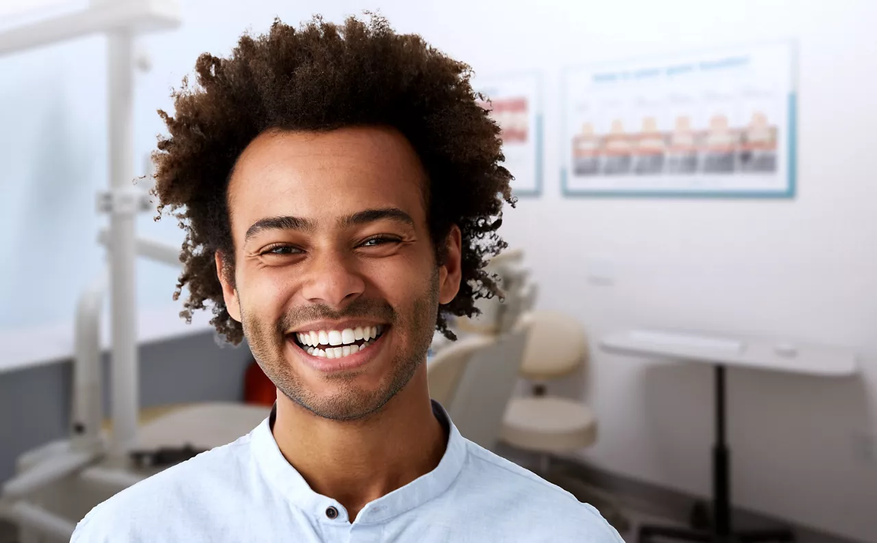 Three females of different generations smiling