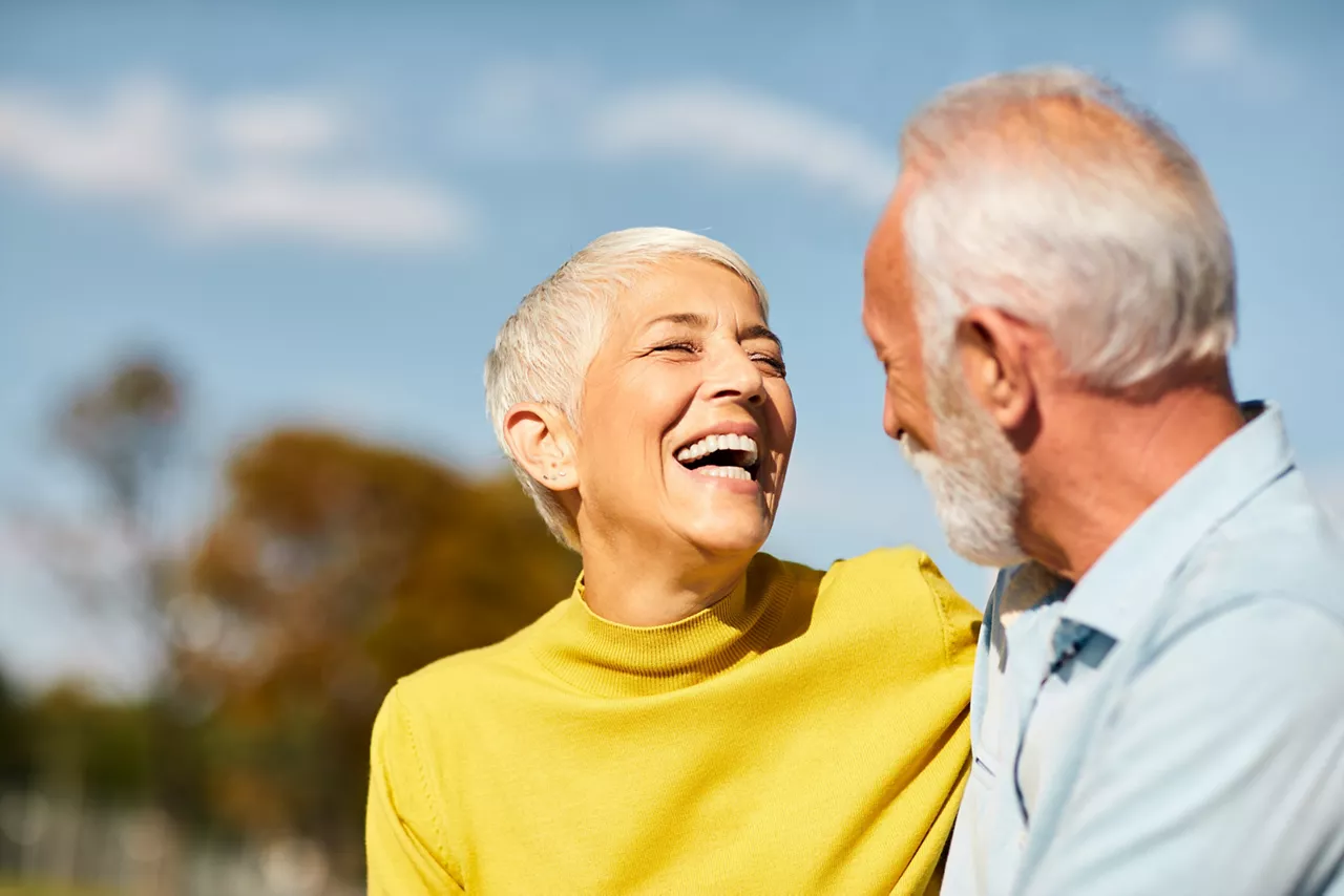 portrait of happy smiling senior couple outdoors