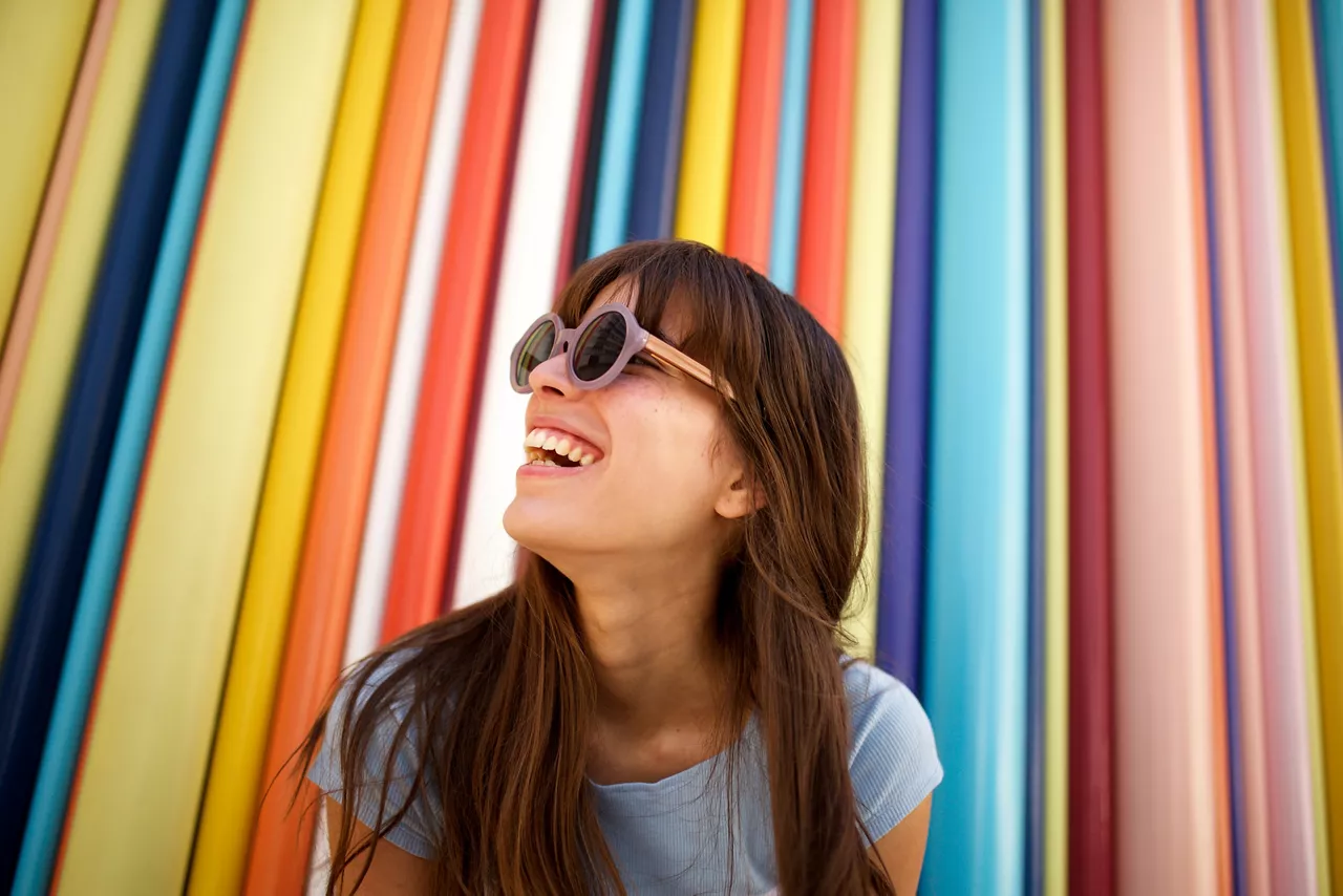 Woman smiling with sunglasses