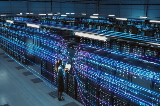 Data Center operators examine the power of a data center cabinet