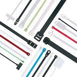 Many different types of cable ties and wire ties displayed flat
