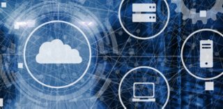 A view of a shipping and packaging facility, showing a conveyor belt with white baskets on top of the belt. 