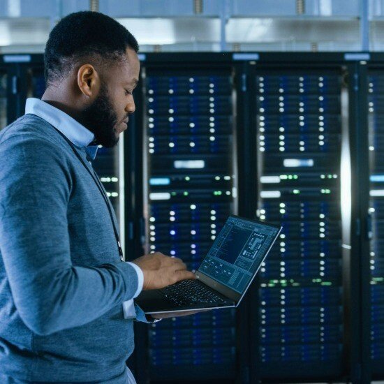 Server racks displaying AI inside a Hyperscale data center environment