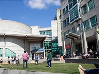 students congregate in an outdoor space at capilano university