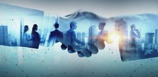 Business partners shaking hands and forming global connections