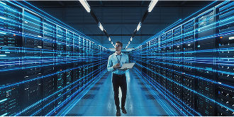 A data center manager walking through a cloud environment
