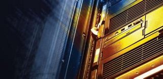 A highlighted gold tinted computer inside a data center