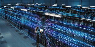 Data center manager working in data center