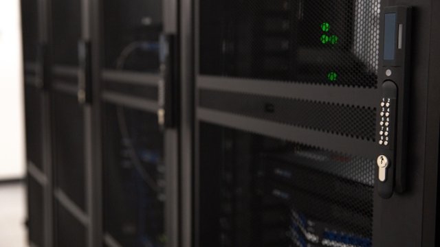 Close-up view of the Panduit FlexFusion cabinet with the security handle