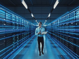 Data on laptop with hands visible typing 