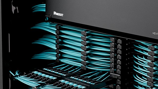 Light blue Panduit HD Flex fiber optic cables in rack
