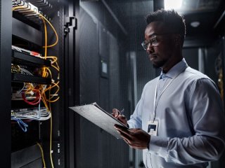 Data Center operator going through his BOM checklist