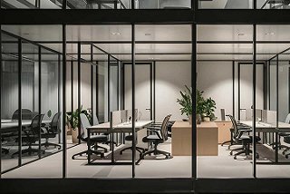 Construction worker laying down rebar